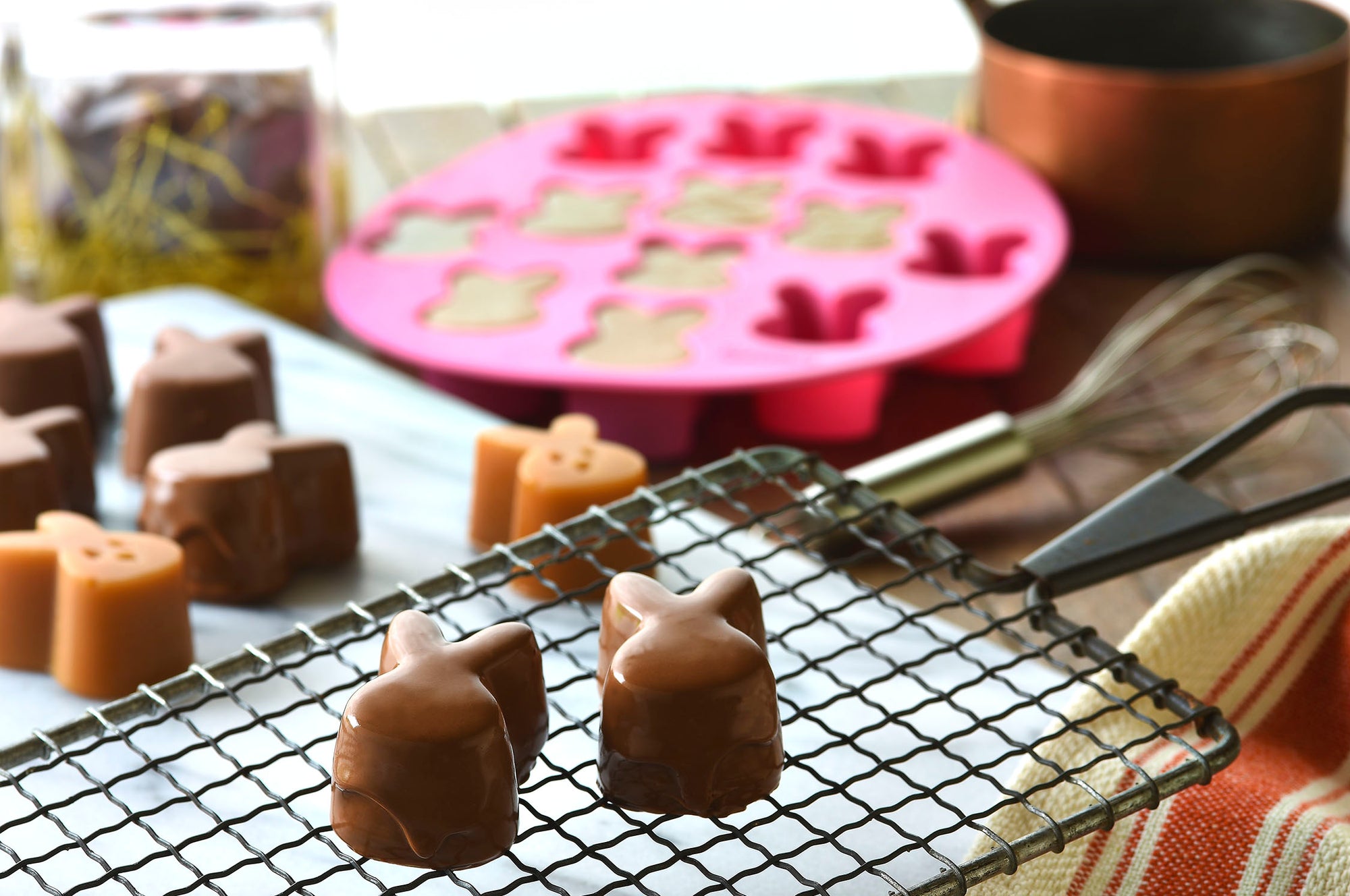 caramel bunnies being made in a kitchen