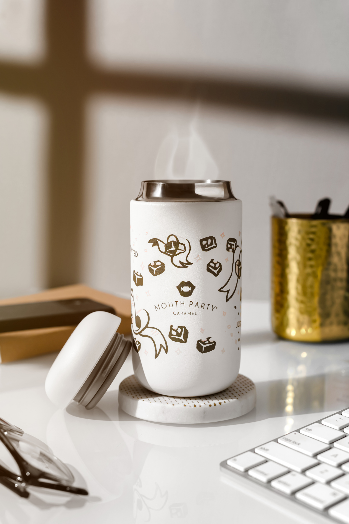 Travel Mugs made by Fellow Mouth Party Caramel Merch